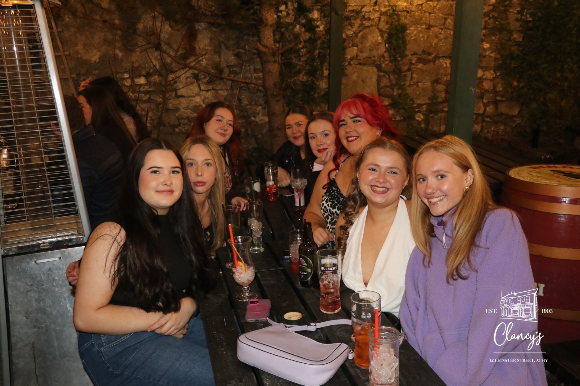 A group enjoying drinks in the beer garden