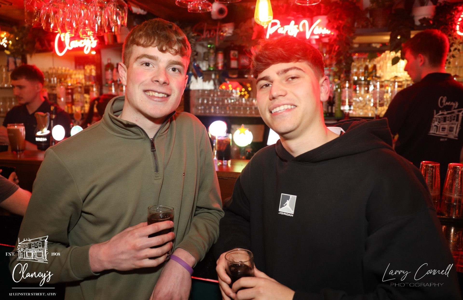 Lads enjoying drinks at the bar